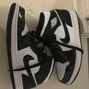 Black and White Nike Air Jordan size 8.5. Worn once or twice. Amazing quality